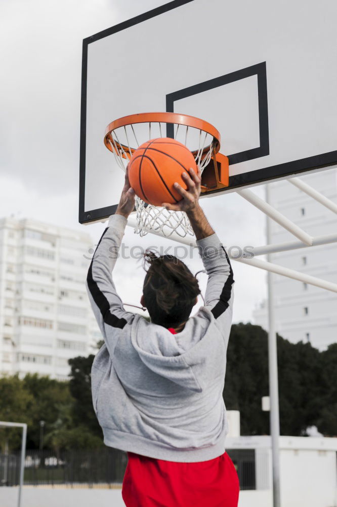 Similar – Image, Stock Photo Young redhead woman in a basketball court