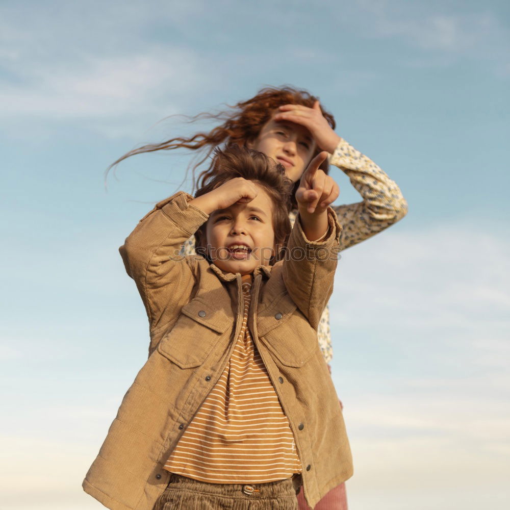 Similar – Low view of a young woman in nature