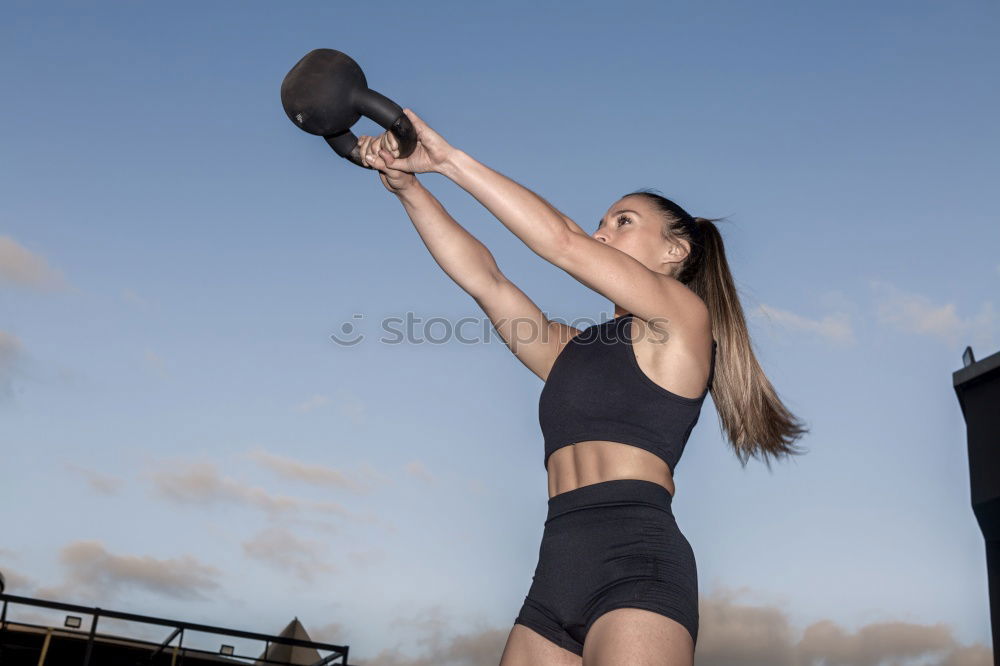 Similar – Image, Stock Photo athletic woman doing her stretching routine
