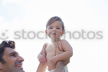 Similar – Image, Stock Photo Mother and son playing on the beach at the day time.