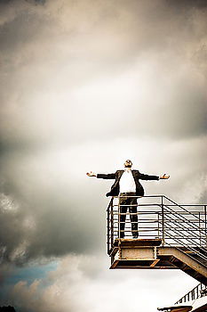 Similar – Anonymous man enjoying storm on pier