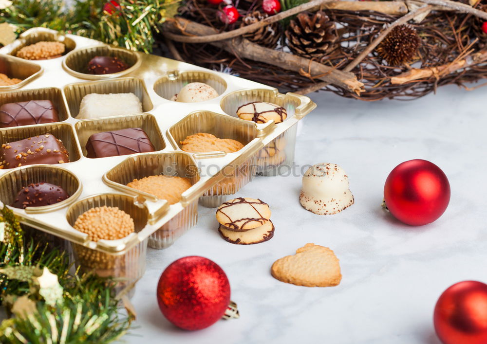 Similar – Image, Stock Photo Woman holding cookies box above christmassy table