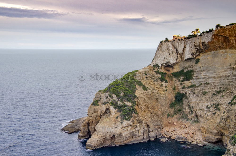 Similar – Wunderschöner Leuchtturm auf den hohen Klippen des Saint Vincent Kaps in der Algarve, Portugal