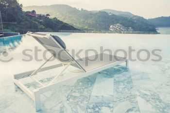 Similar – Image, Stock Photo Woman looking at hills on lake