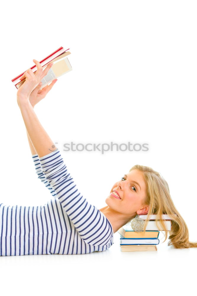 Similar – Image, Stock Photo Schoolgirl reading a book in classroom