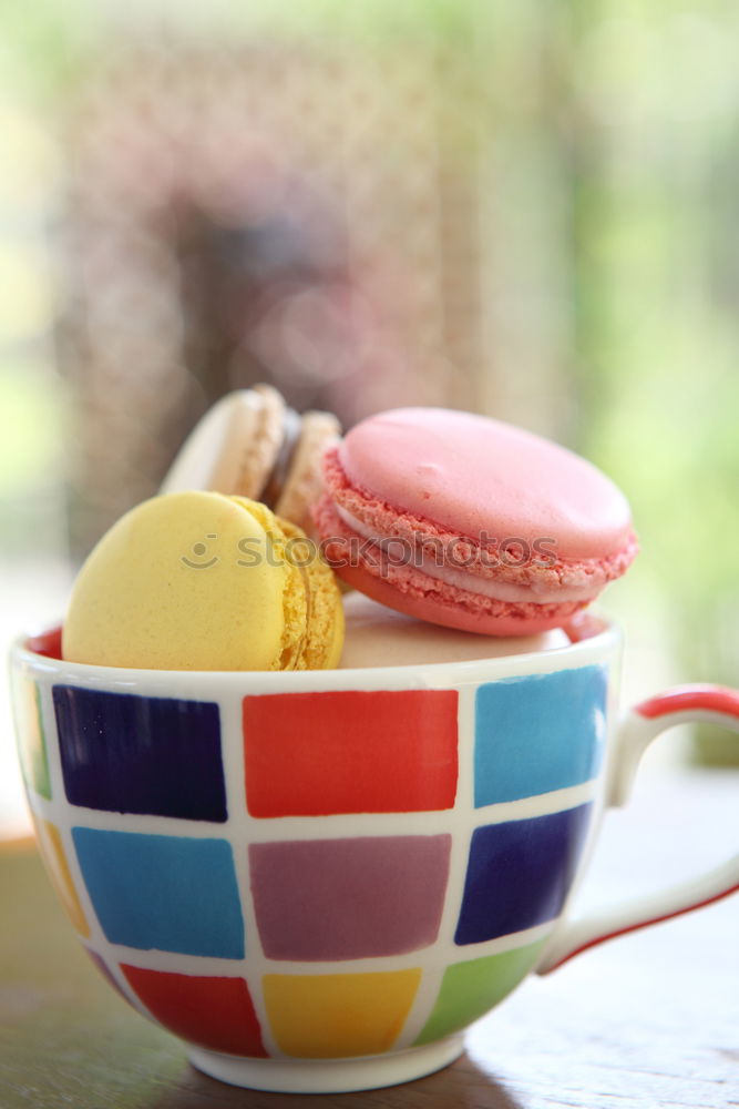 Similar – Image, Stock Photo macarons in a white ceramic cup