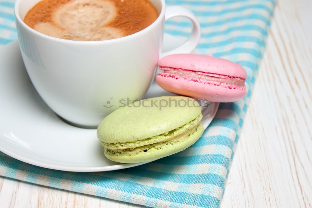 Similar – Image, Stock Photo macarons in a white ceramic cup