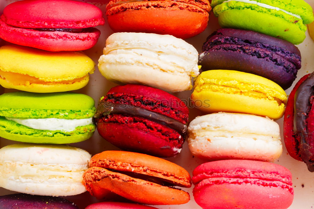 Similar – Multicolored macarons in a paper box