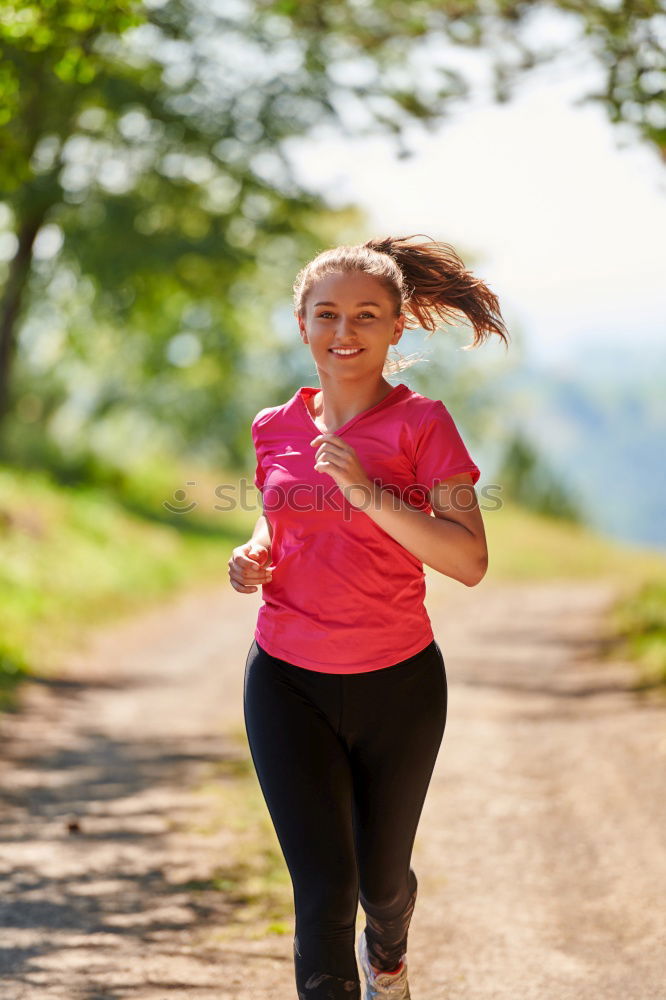 Similar – Image, Stock Photo Athletic woman out jogging in a forest