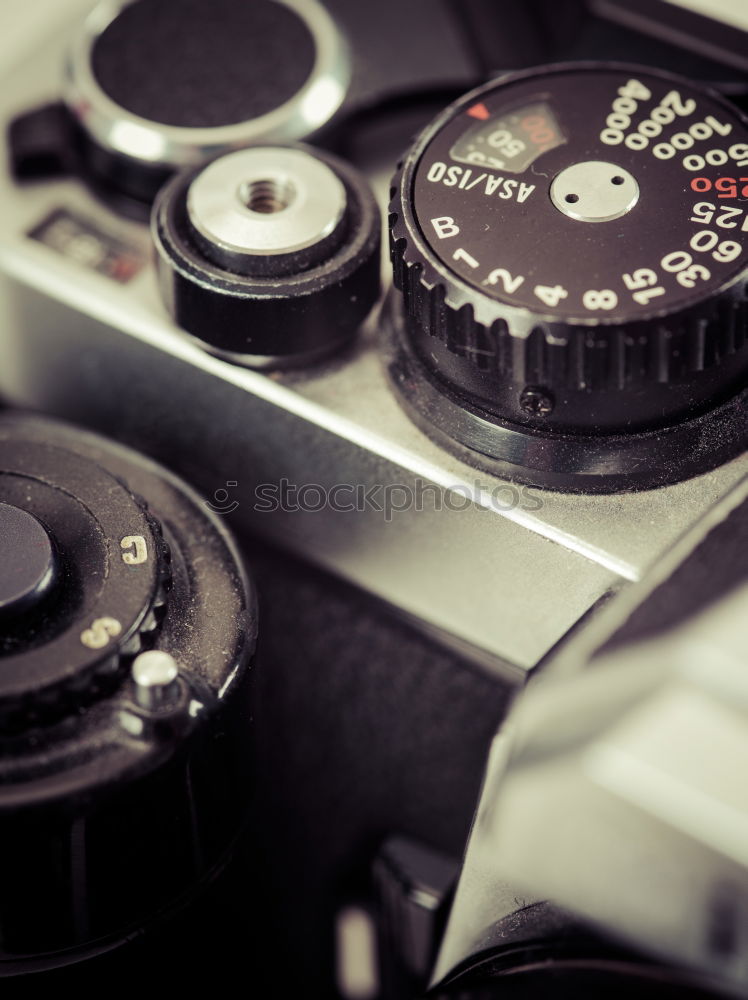 Similar – Carburetors for a car engine with tools on wooden table