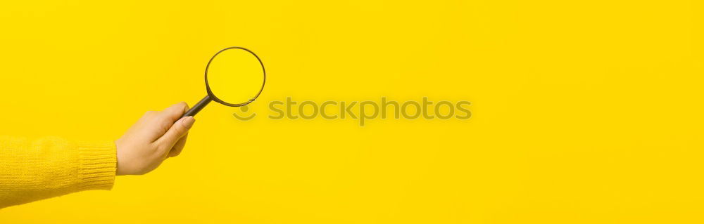 Similar – Magnifying glass on yellow background