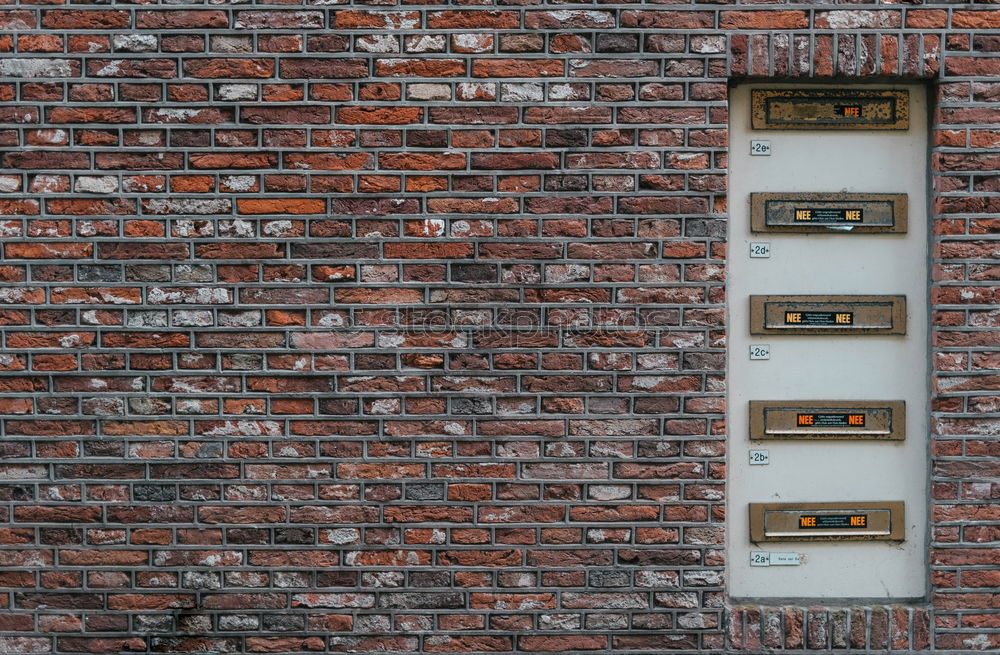 Similar – Two windows of a warehouse with red clinker and closed windows