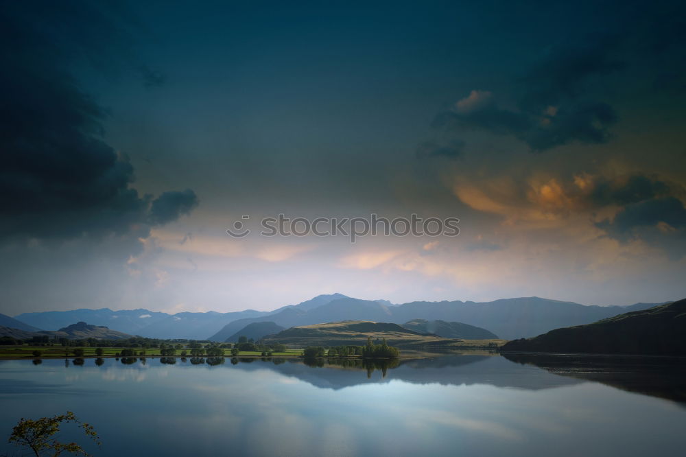 Similar – Image, Stock Photo Green mountains in sunlight and lake