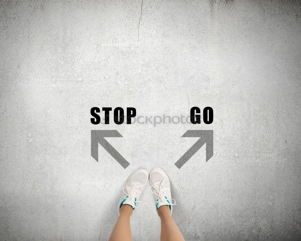 Similar – Image, Stock Photo stop sign on the ground in front of feets