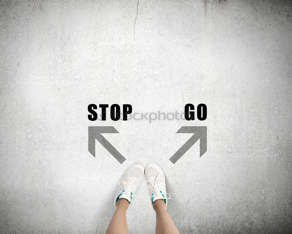 Similar – Image, Stock Photo stop sign on the ground in front of feets