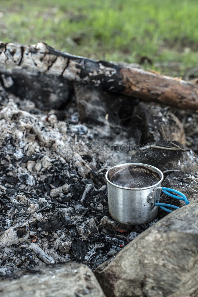 Similar – Making coffee on campfire