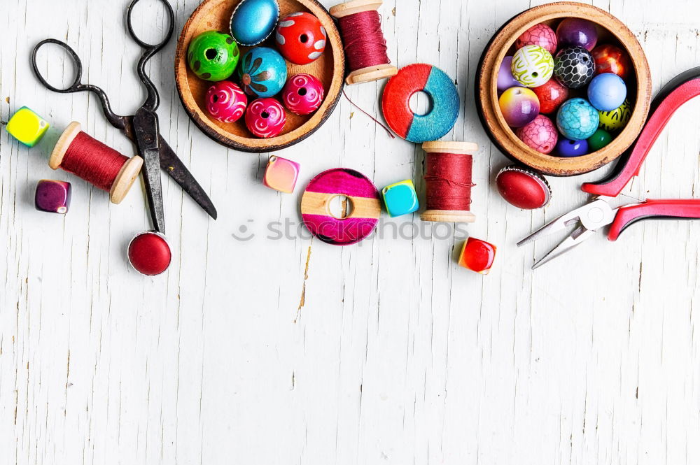 Similar – Image, Stock Photo Making necklaces of colored beads