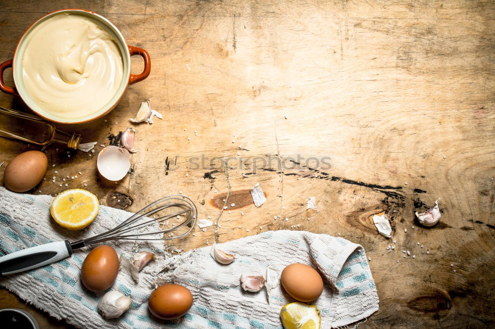 Similar – Image, Stock Photo Tea- Time: a tea cup with tea bag, sugar and cookies on a wooden table