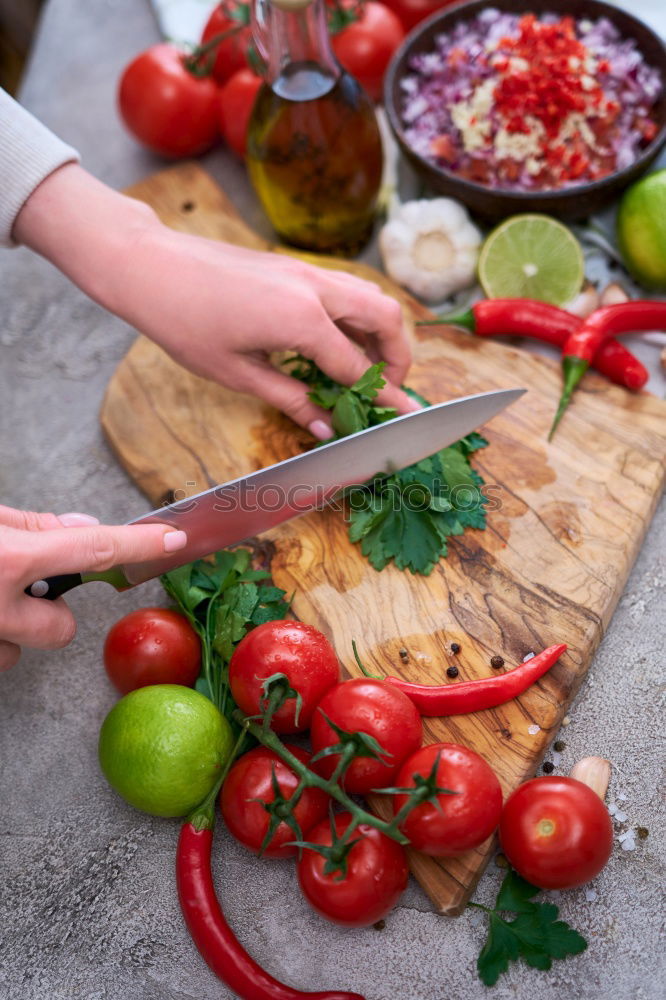 Similar – process of cutting slices of fresh carrots