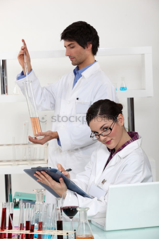 Similar – Image, Stock Photo Women standing and working in lab