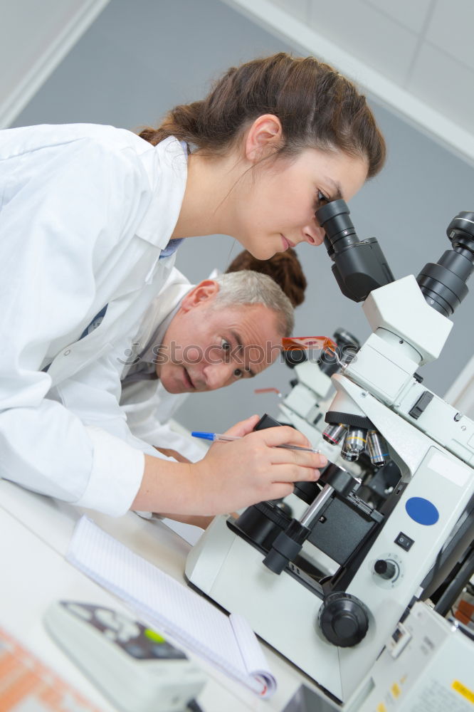 Similar – Image, Stock Photo Woman looking at microscope