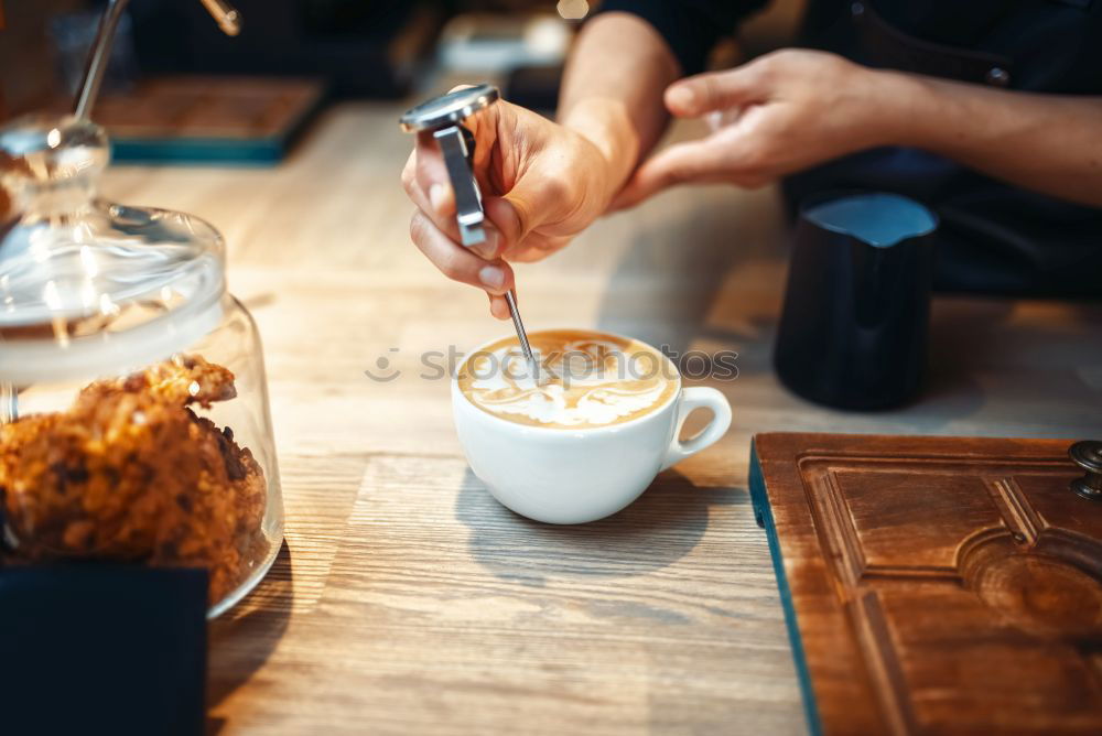 Similar – Image, Stock Photo Man stirs with spoon in coffee