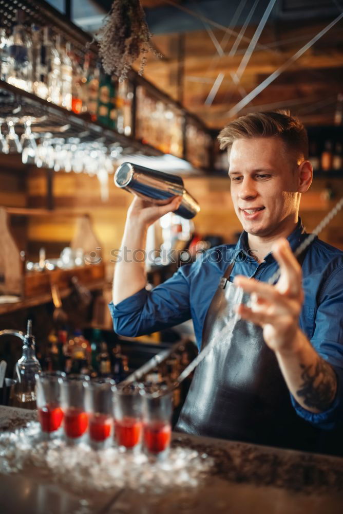 Similar – Image, Stock Photo Barman is making cocktail at night club