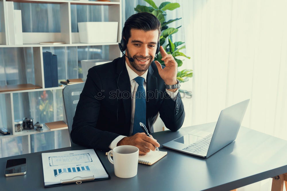 Similar – Image, Stock Photo Handsome businessman with striped tie sits at table with coffee making phone call and using his tablet