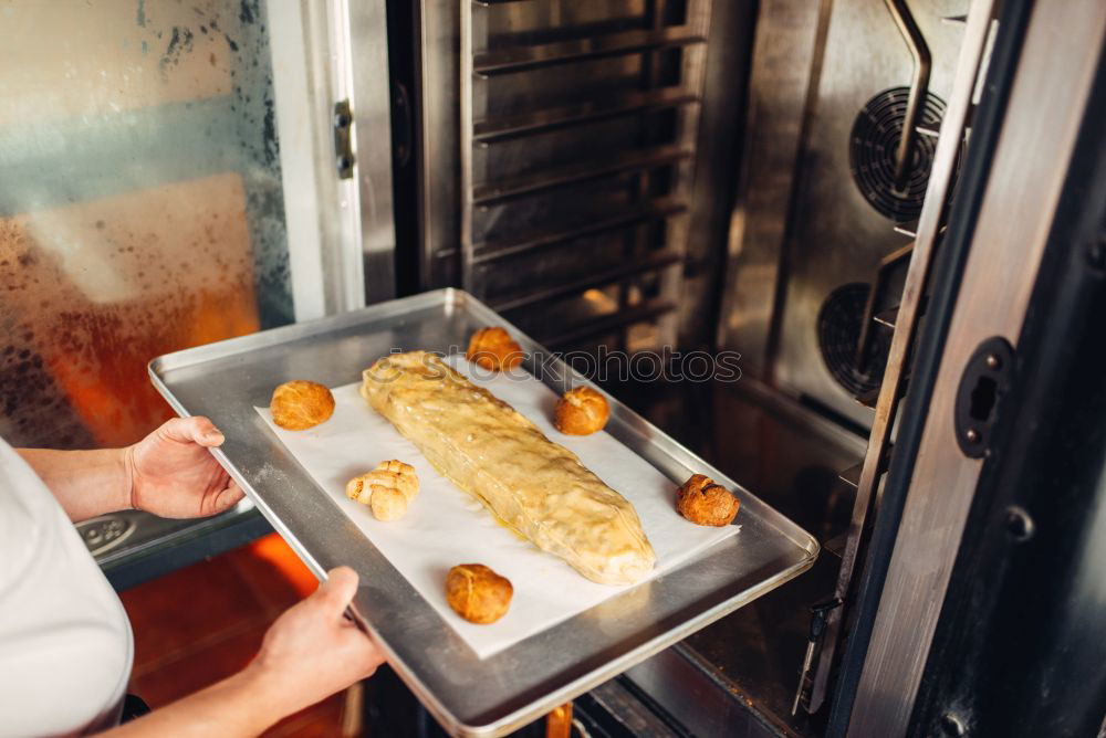 Similar – Image, Stock Photo woman hands sprinkling white flour over croissants