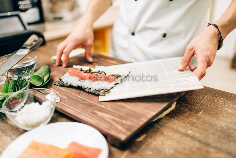 Similar – Crop woman eating sushi