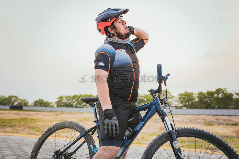 Similar – Image, Stock Photo Sporty young woman in helmet with bicycle looking at camera