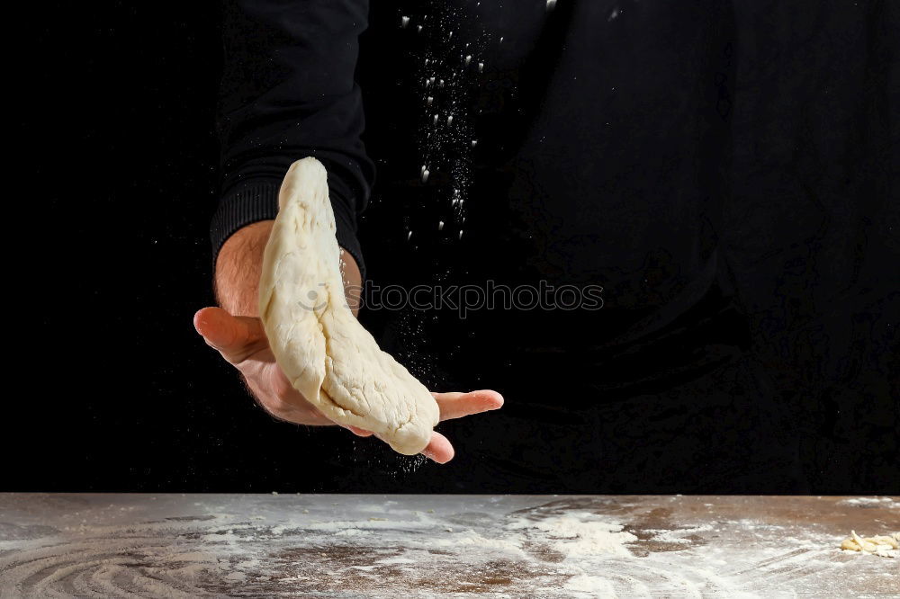 Similar – Image, Stock Photo male hands substitute white wheat flour dough