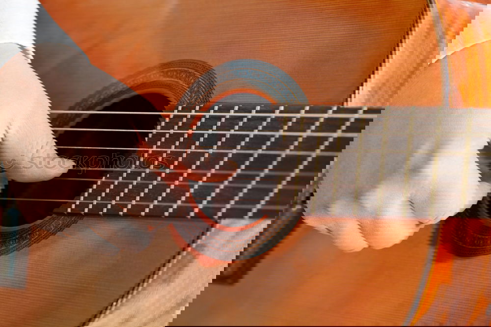 Similar – Foto Bild Eine Frau spielt barfuß Gitarre
