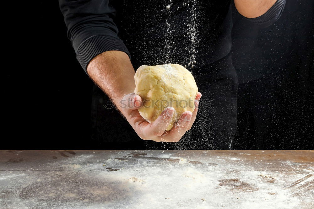 Similar – Image, Stock Photo male hands substitute white wheat flour dough