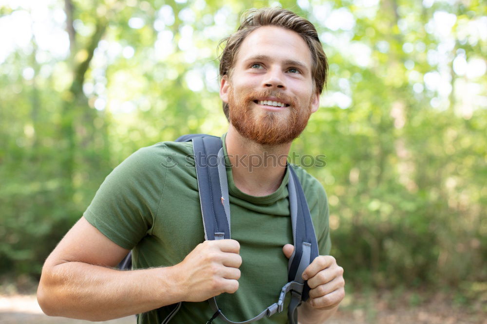 Similar – Male trail athlete posing with race number