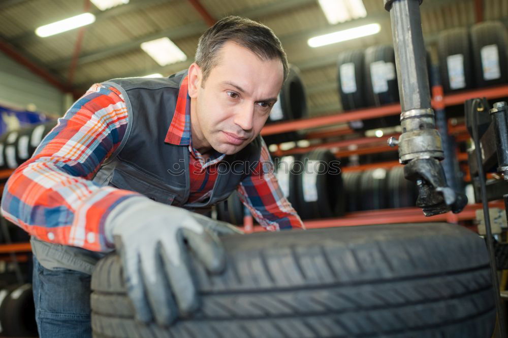 Similar – Professional Car Mechanic working.