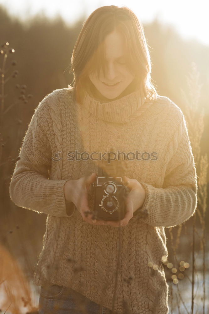 Similar – Image, Stock Photo Young beautiful woman in yellow dress taking pictures