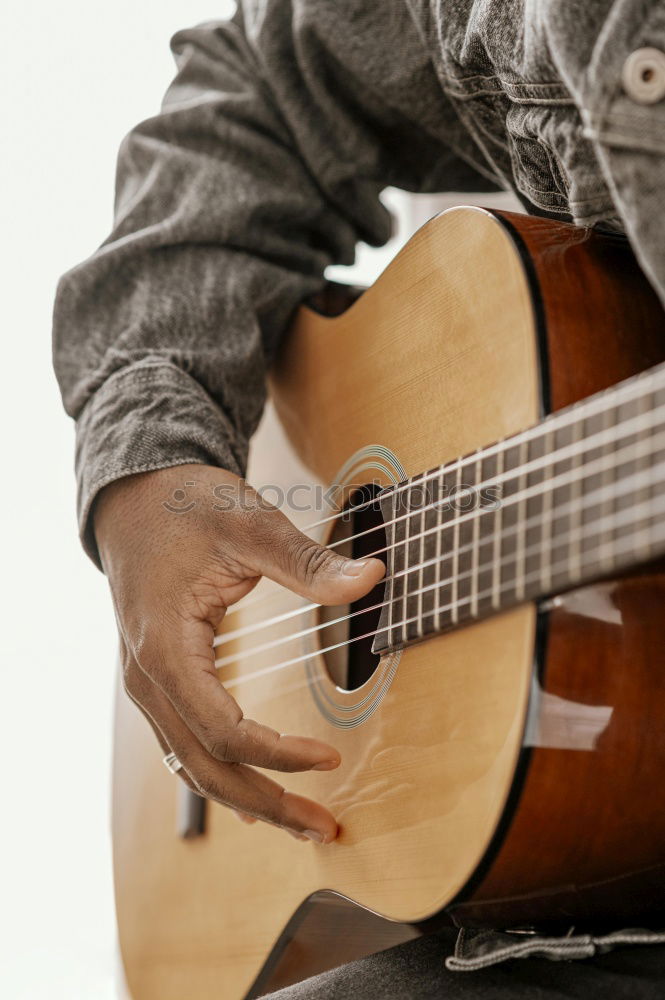 Similar – Foto Bild Eine Frau spielt barfuß Gitarre