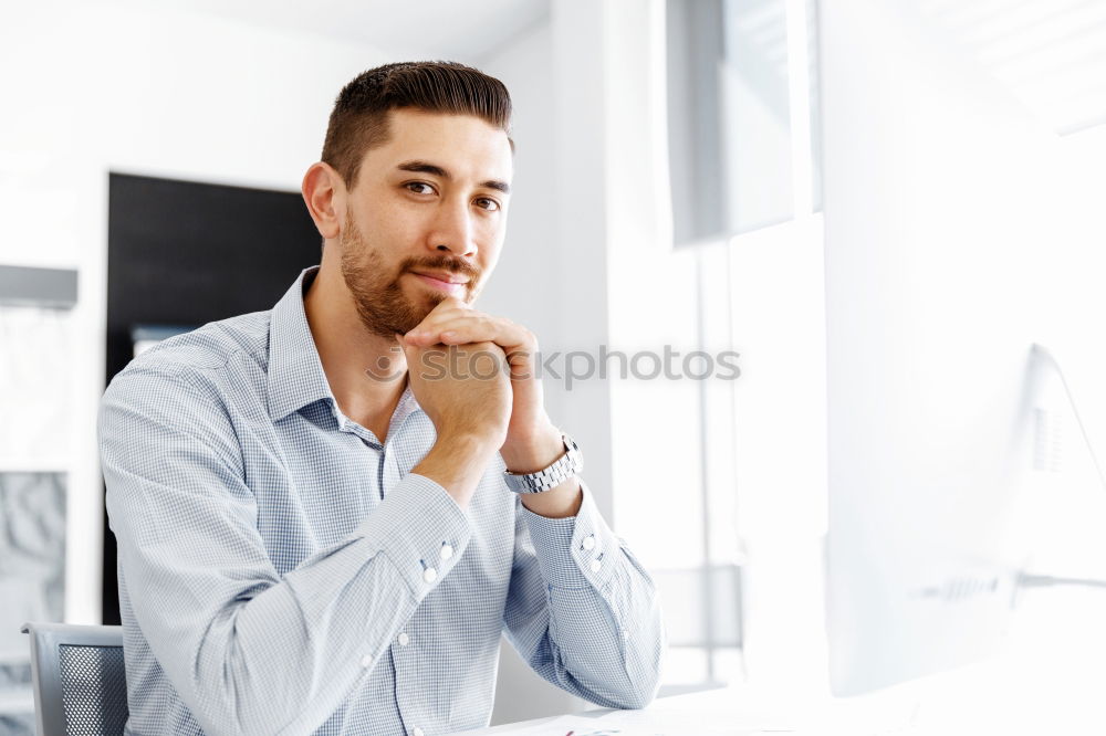 Similar – Bearded man in sunglasses looking at the window