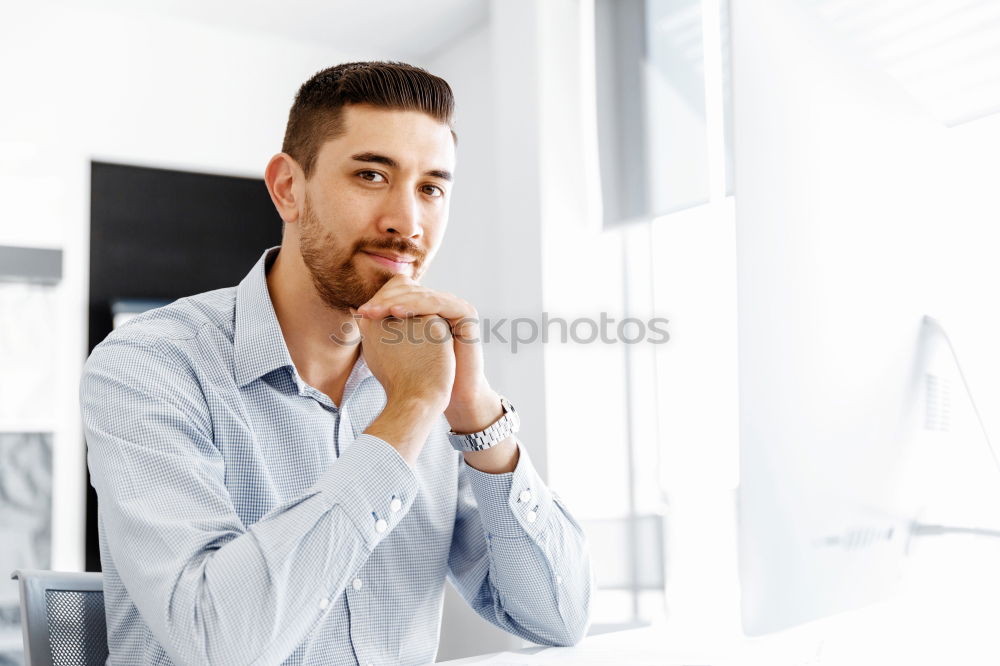 Similar – Bearded man in sunglasses looking at the window