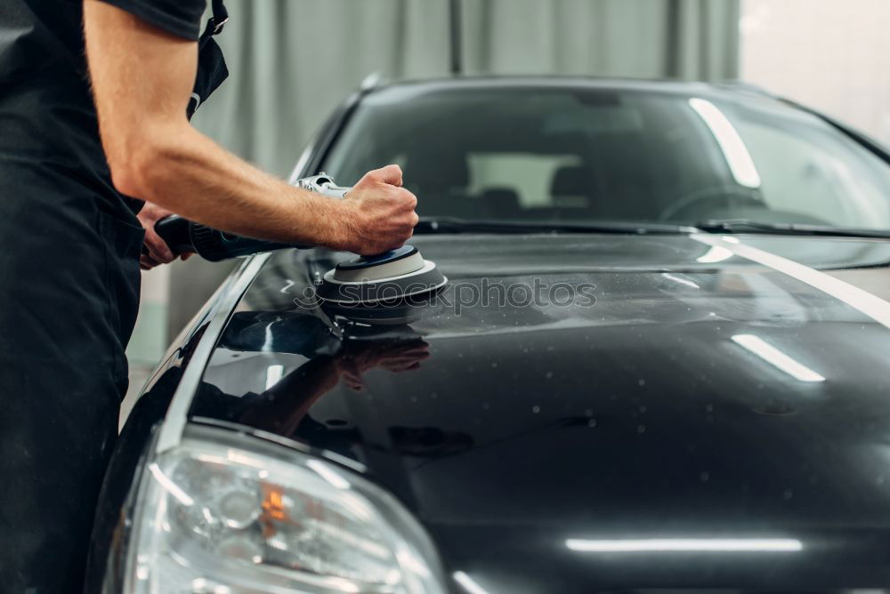 Similar – Motorcycle mechanic changing a fuse