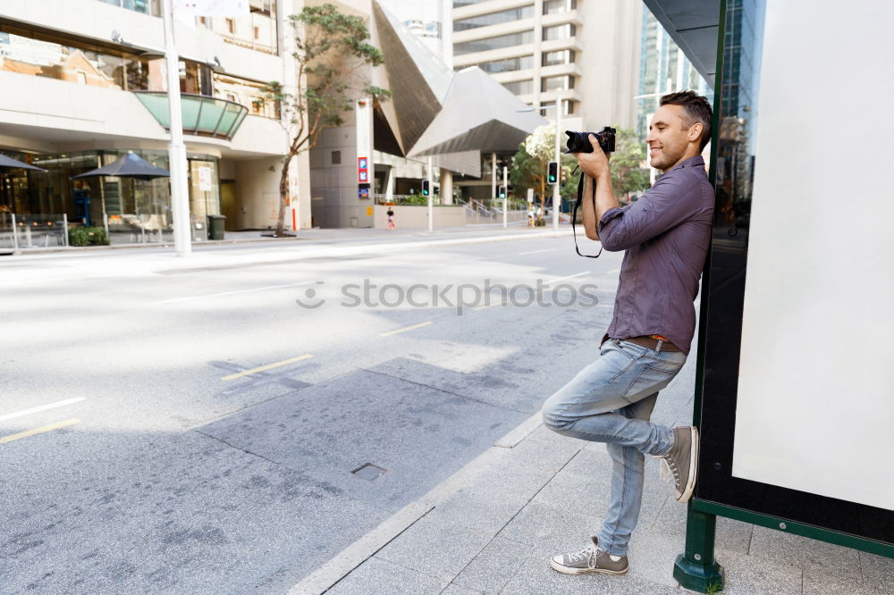 Similar – Image, Stock Photo two friends in the street taking pictures with mobile phone