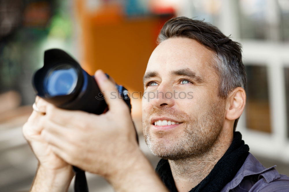 Similar – Attractive man sitting in a restaurant