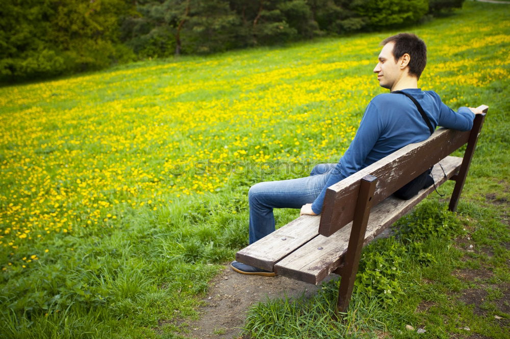 Similar – Image, Stock Photo Jule Young woman with dreads reading on a bench in the country