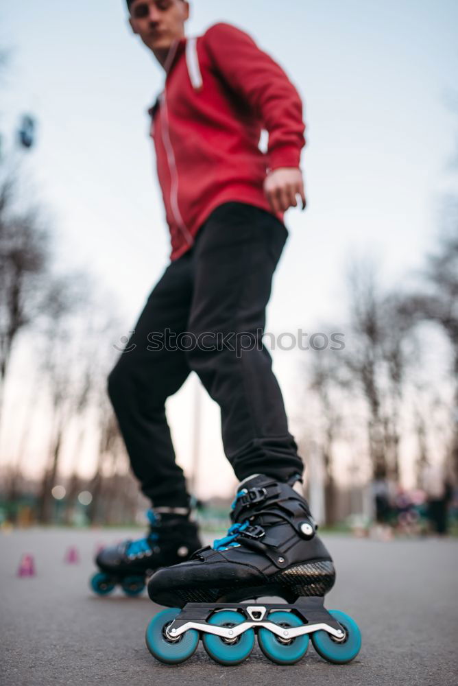 Similar – Kid skateboarder doing a skateboard trick.