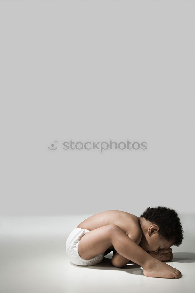 Similar – Image, Stock Photo Woman lying on wooden table with crossed naked strong legs