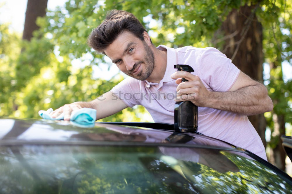 Similar – Image, Stock Photo Man worker washing car with sponge