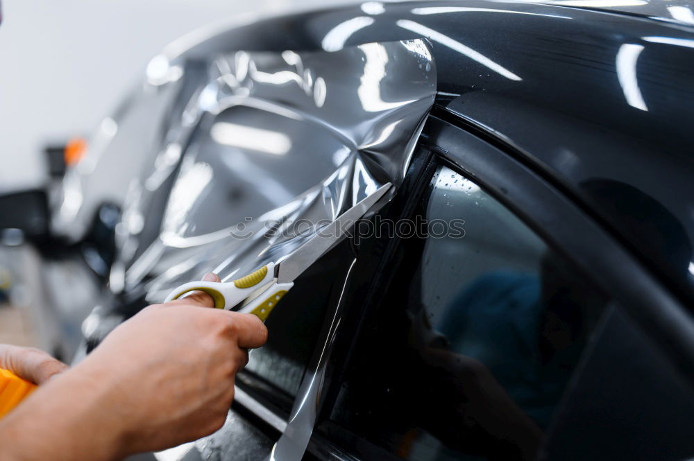 Similar – Motorcycle mechanic changing a fuse