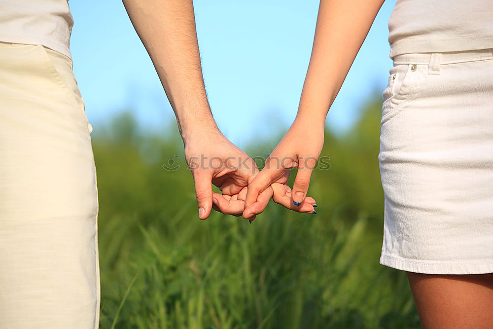 Similar – Two young women in walking holding her hands