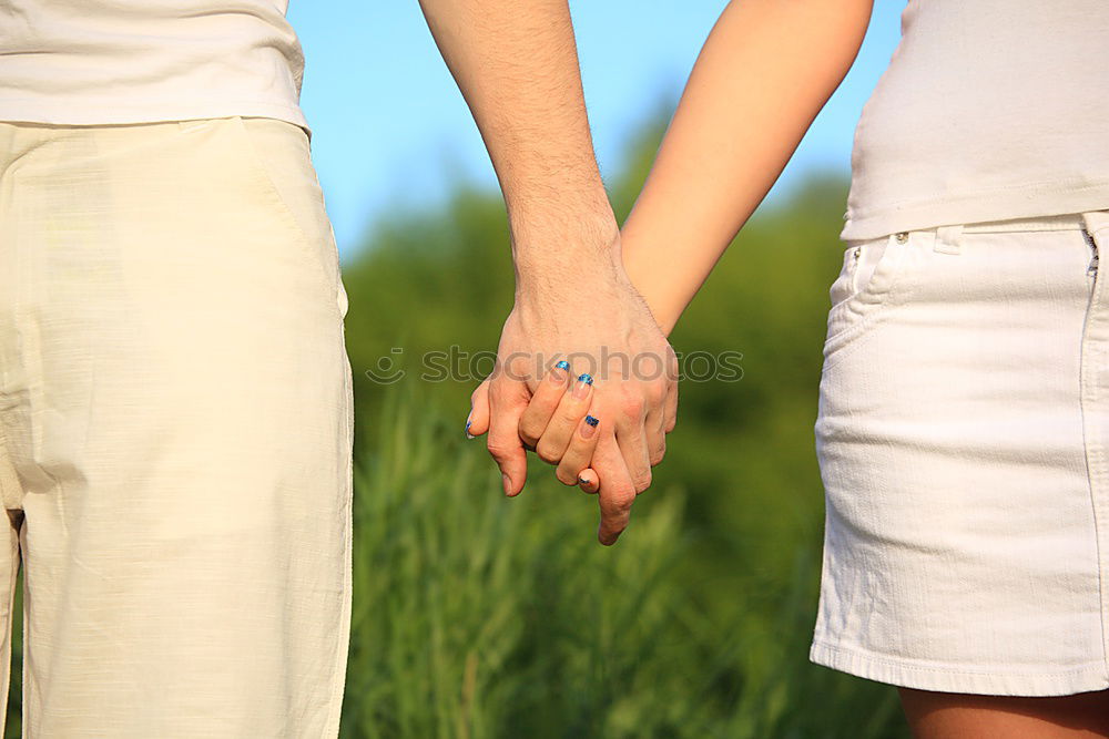 Similar – Two young women in walking holding her hands